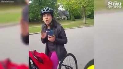 Furious row after cyclist hit toddler