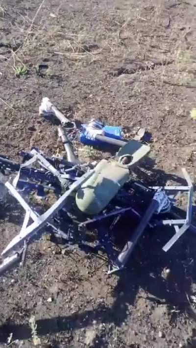 RU POV: Downed Baba Yaga drone covered in netting 