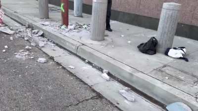 Protestors are taking hammers to cement blocks to break them down and use against DHS police.