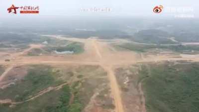 The work of the Chinese GSL-130 self-propelled rocket mine clearance system.