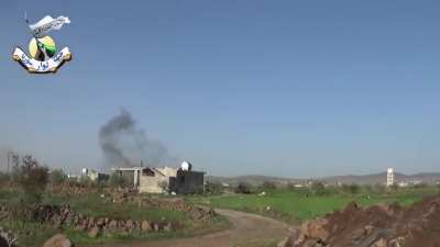 Syrian Revolutionaries Front fighters share a giggle as Syrian Army fire whizzes overhead - al-Hajjah - 2014