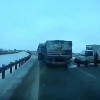 Avoiding a truck stopped in the middle of the road.