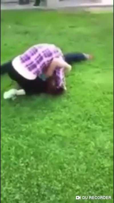 Dominant girl humiliates submissive opponent at the end.