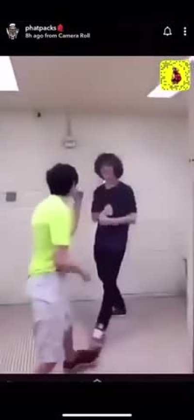 Buttfuck buddy gets bitchslapped by non-nigga