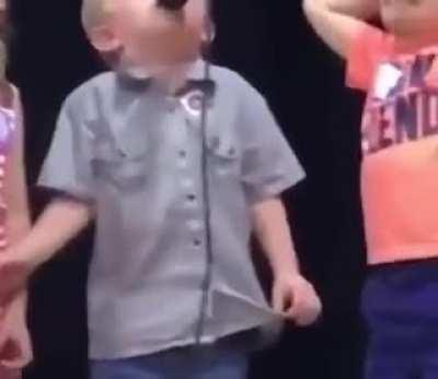 Kid was supposed to be singing 