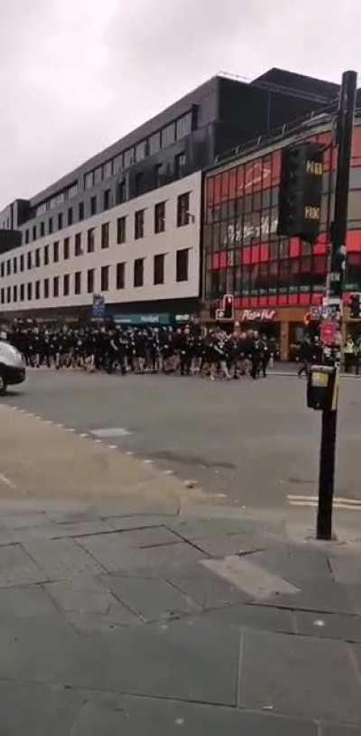 Rangers fans singing 'the famine song' an anti-catholic song about the Irish famine on the streets of Glasgow today