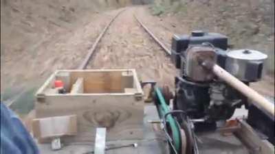 Guy makes a homemade motorized trolley for 20km of rail tracks that has been abandoned for over 10 years