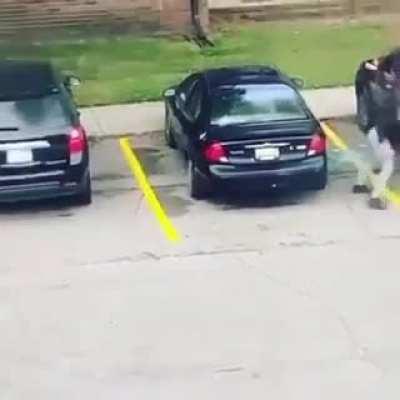 Lighting a car on fire.