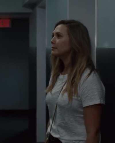 Elizabeth Olsen’s breasts look so good in that shirt