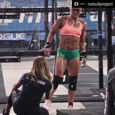 Her muscles glistening in sweat . Katrin