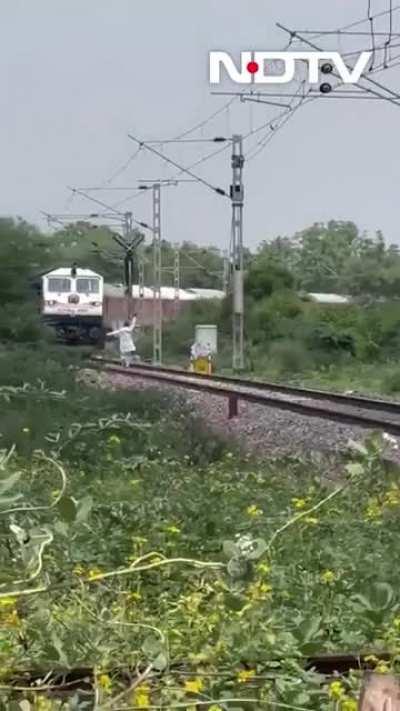 Man hit by a Train in India (GRAPHIC)