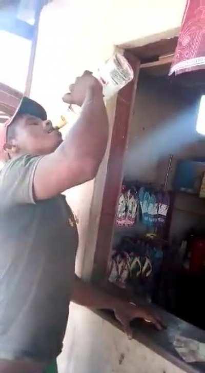 Drinking a whole bottle of hard liquor on a bet to win 100 bucks (or lose 200 if he can't do it)