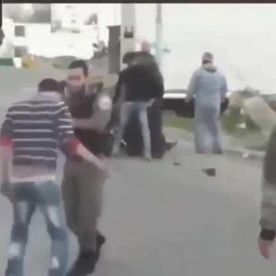 IDF push man off of wheelchair then shoot towards the people attempting to assist him