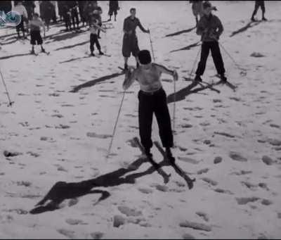 A shirtless Mussolini enjoying some winter recreation, 1938.