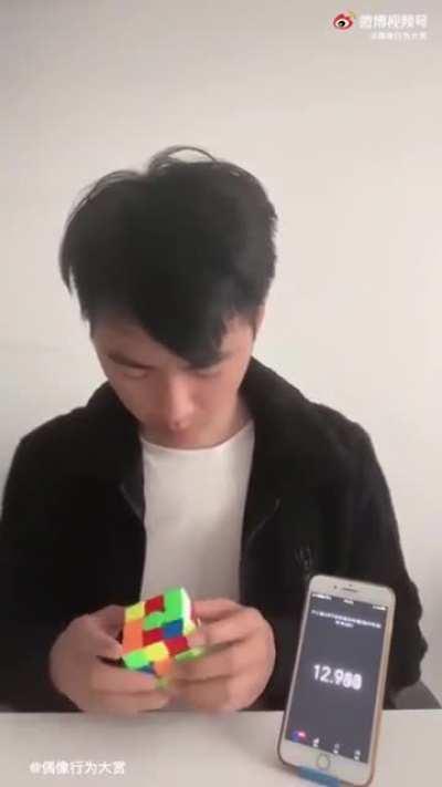 Guy solves the Rubik’s cube in a unique way