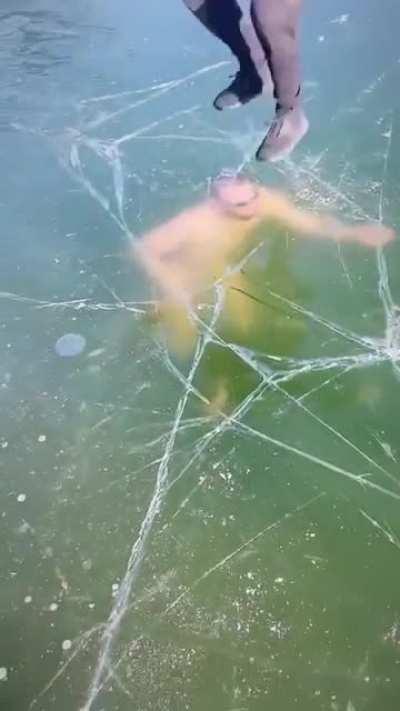 Idiot nearly dies in freezing cold lake