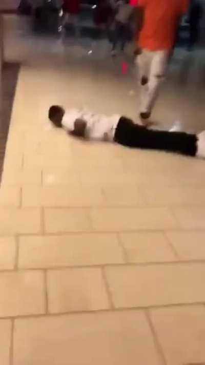 Aggressive person stomps the head of his victim