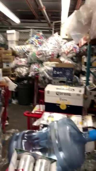 A grocery back store full of can and bottle after a holiday