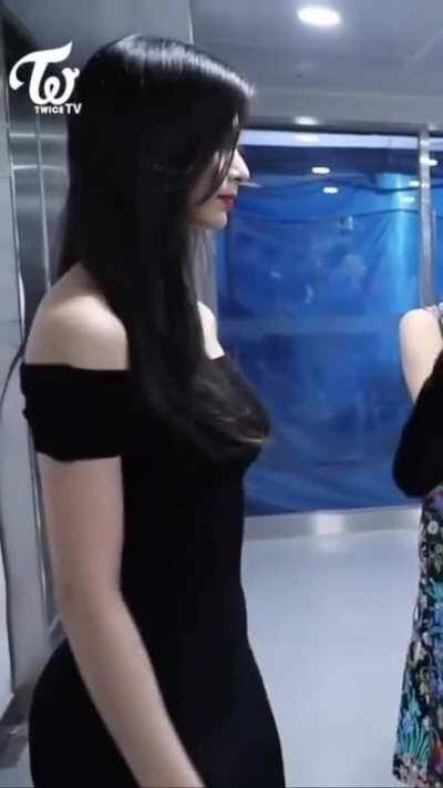 Tzuyu in a black dress