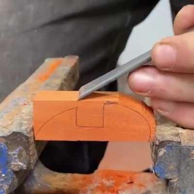 Satisfying carving of a wooden apple