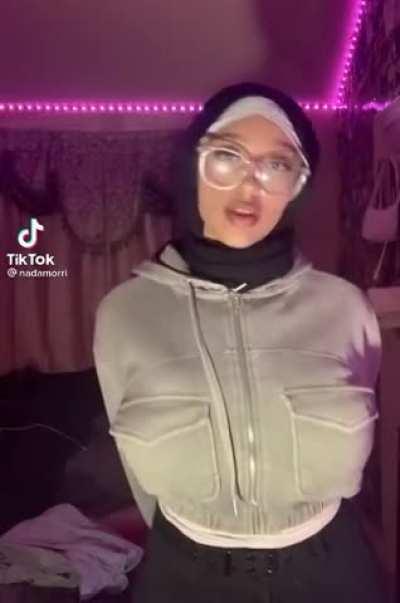 She’s been trying to hide them lately, but she’s literally too busty to hide!