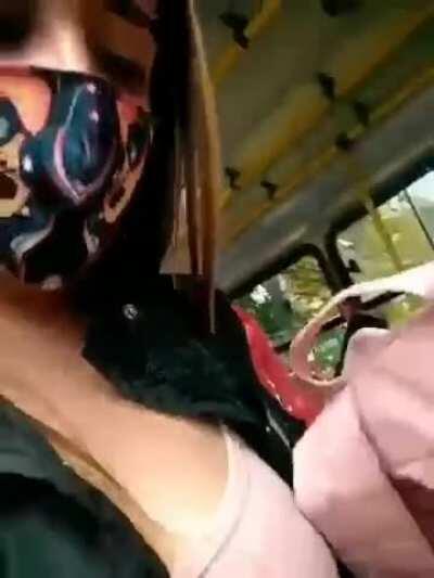 Hot girl fingering her pussy in the bus