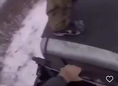 Soldier throws down a missile after it misfires.