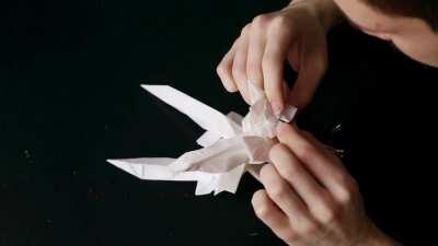 Folding process of an origami samurai from a single sheet of paper