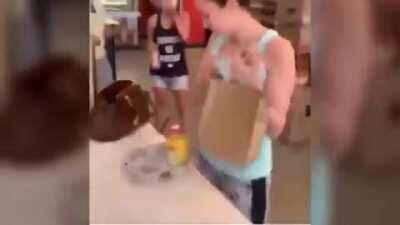 A crazy woman coughs on people in an NYC bagel shop