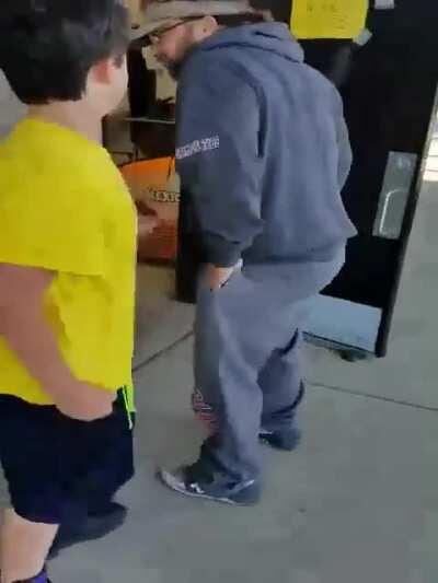 Kid tries to fight an older man