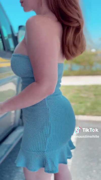 She's wearing that dress.