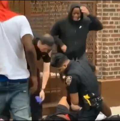 NYPD administers life saving trauma care on victim of gunshot wound.