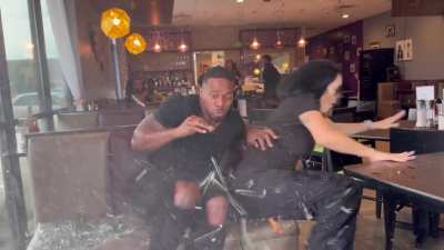 Food influencers were hit by a car while reviewing a burger inside a restaurant.