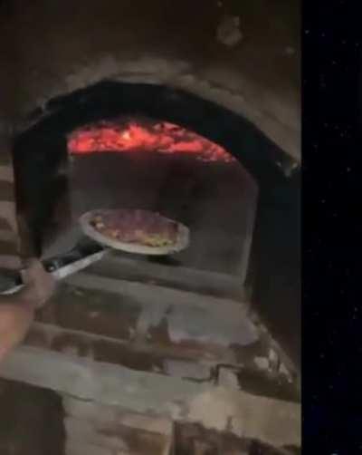 Shaking a pizza