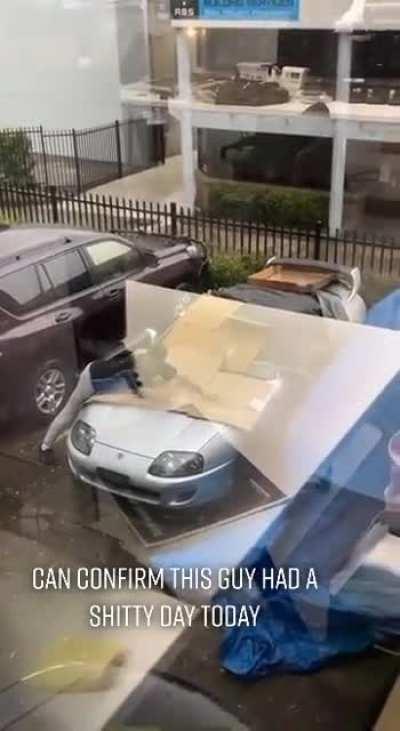 Man Uses Own Body to Defend Toyota Supra From Hail Storm