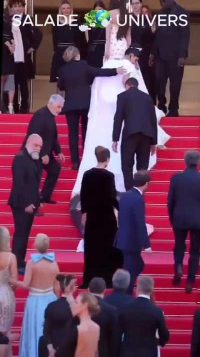 Dominican actress Massiel Taveras was rudely rushed out of the carpet as she posed for photos at the Cannes Film Festival.  The same security guard was involved in an incident with Kelly Rowland.