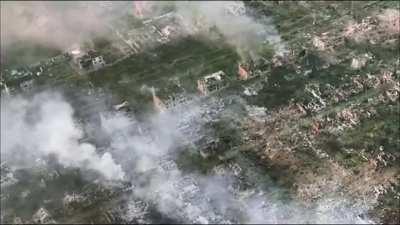 Drone footage shows the sheer amount of damage done to Bakhmut, amidst incoming artillery. (Music from source)