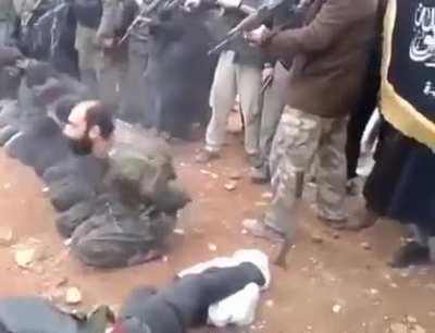 EXTREMELY NSFW. Taliban executing people in Afghanistan.