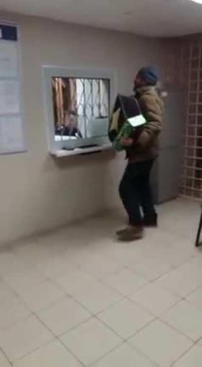 Russian man sings at a police station