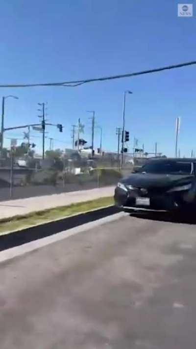 alternate angle: the moment a train slammed into a small plane that crashed onto tracks in Los Angeles
