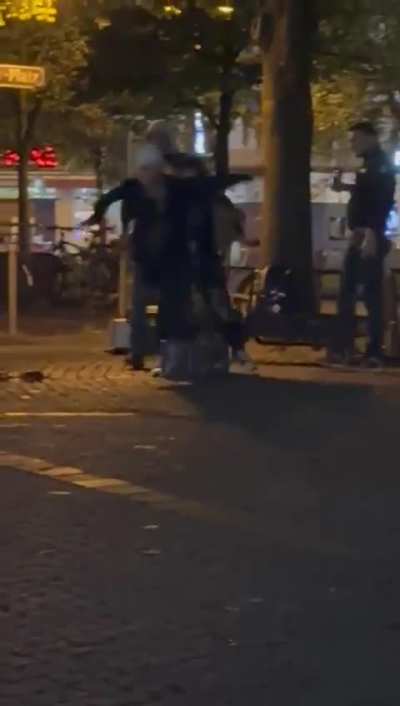 Woman throws beer crate in Germany