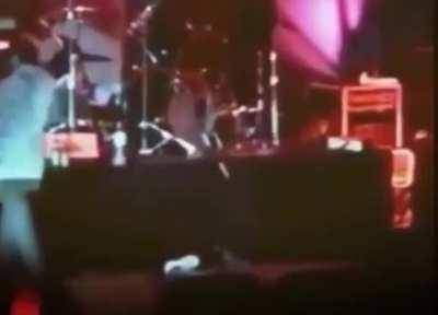 Hold my beer and let me jump into the drum-set (and yes, that's Kurt Cobain)