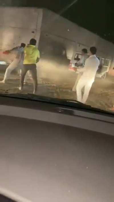 people try to catch a leopard with bare hands and by surrounding it