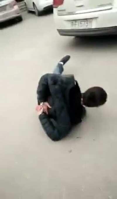 Chinese Police -- savagely beat Uighur who is in handcuffs