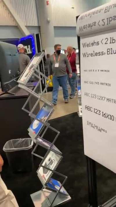 A wireless handheld printer in action