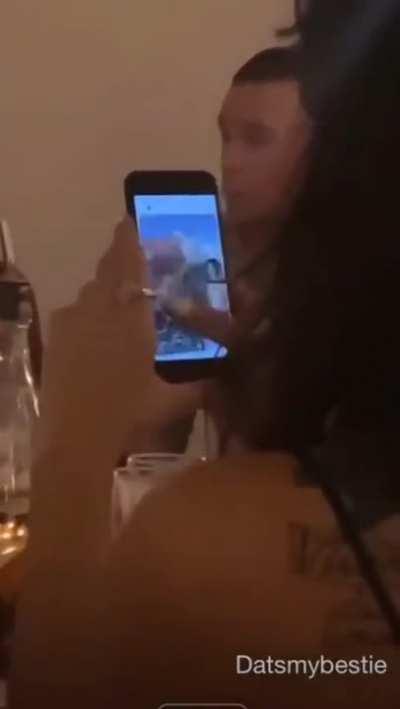 she turned back and slide the guy off that chair.