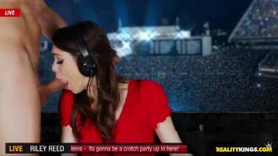 Riley Reid is interrupted during her sports coverage