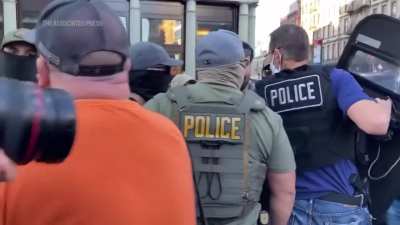 Protesters surround immigration agents conducting a sweep in NYC’s Chinatown