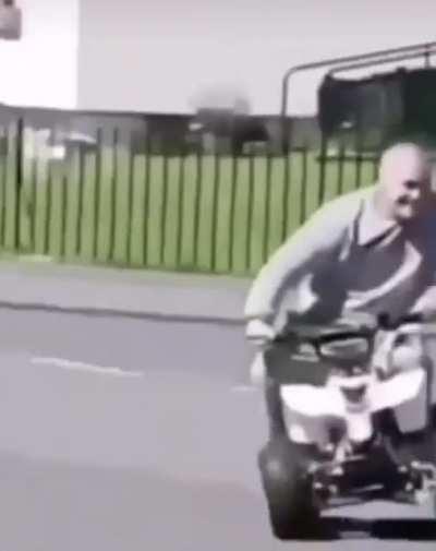 Old man tries to be impressive on the quad bike