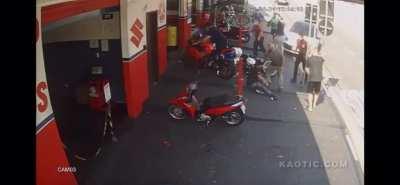 Two scooter riders become meat missiles and take out a third person.